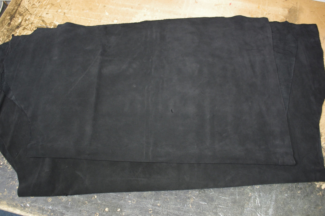 1.4 to 1.6 mm thick water resistant black suede, made in Spain.