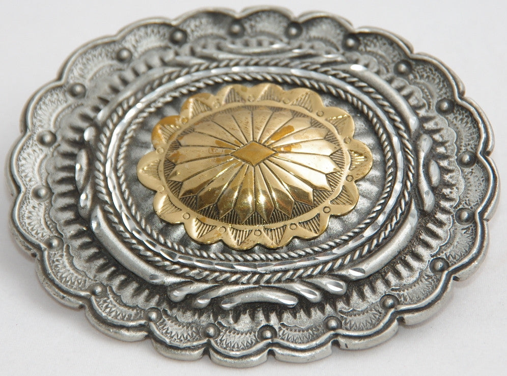 Large conchoe belt buckle, pewter with brass centre. Made in USA