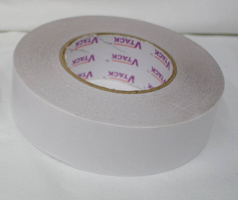 Strong double sided tape to stick embroidered patches in place for sewing
