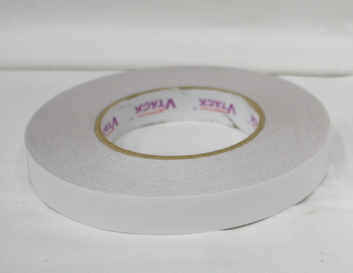 Strong double sided tape to stick embroidered patches in place for sewing